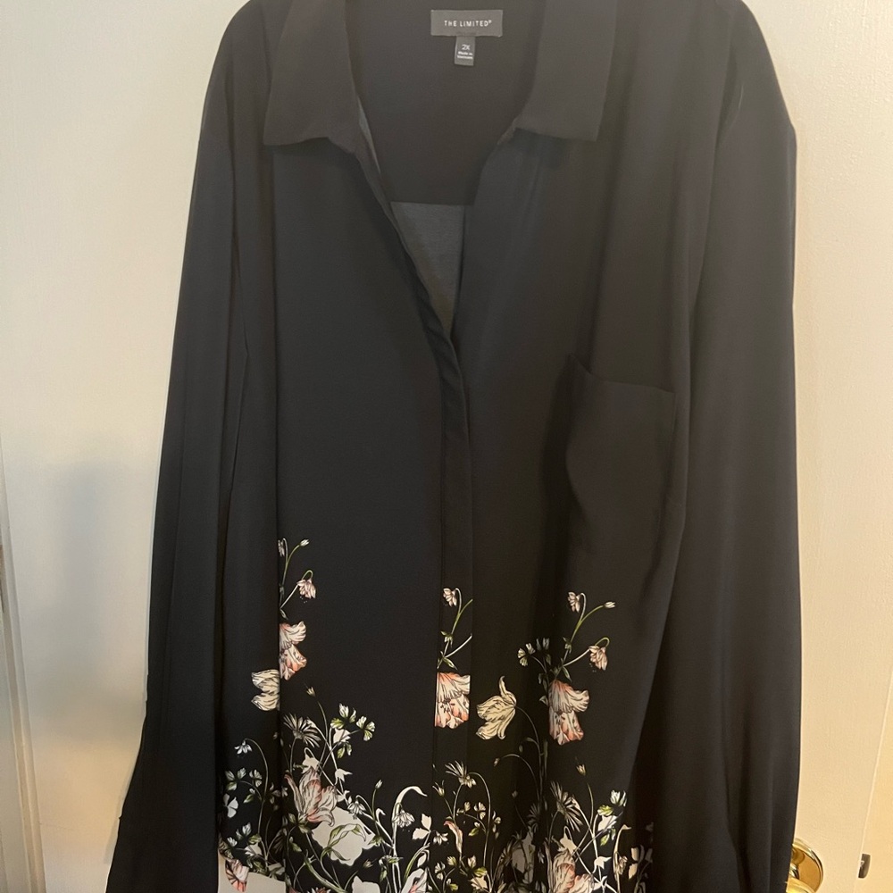 Black top with multicolored Floral arrangements Slippery an comfy polyester